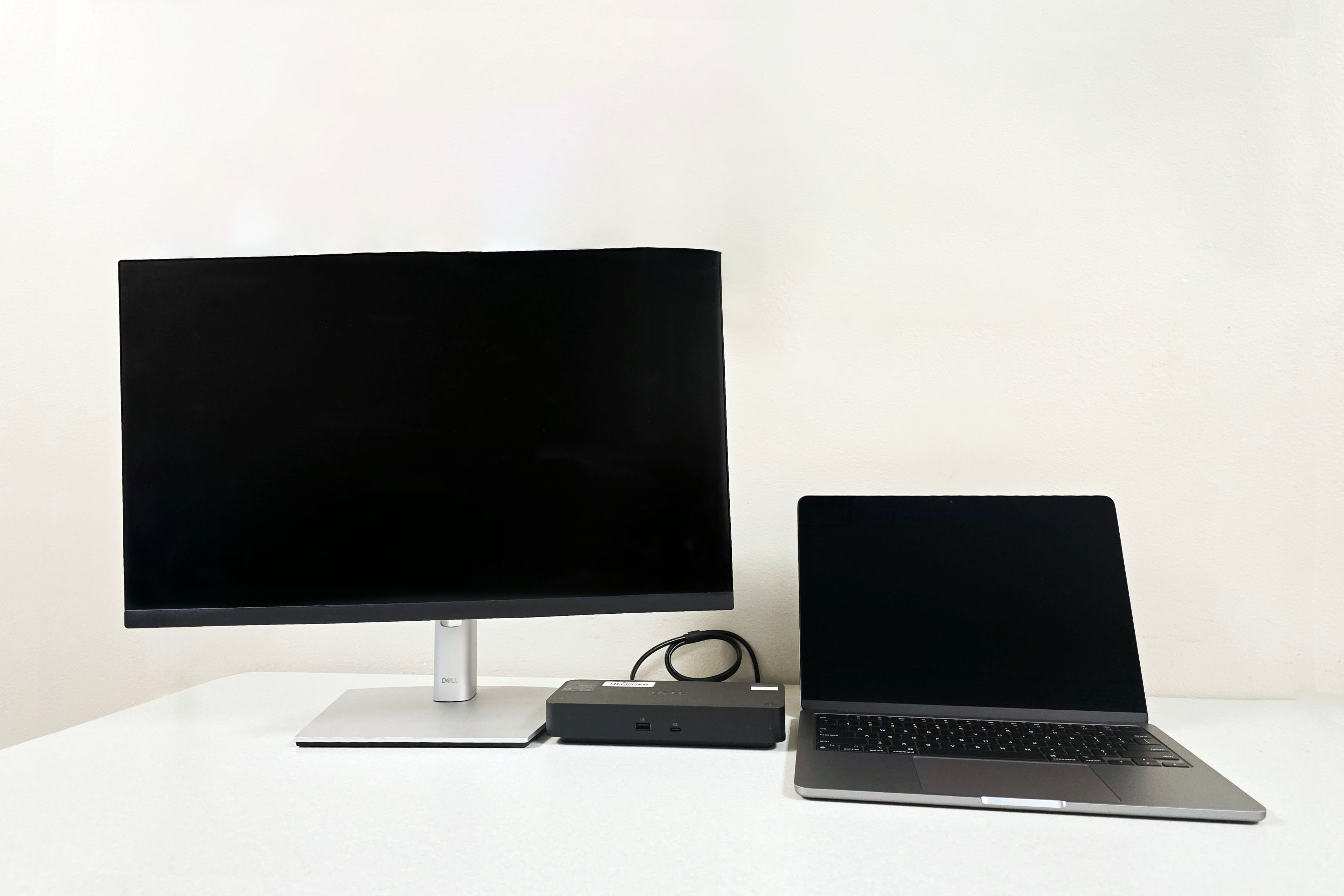 MacBook Pro laptop with two monitors