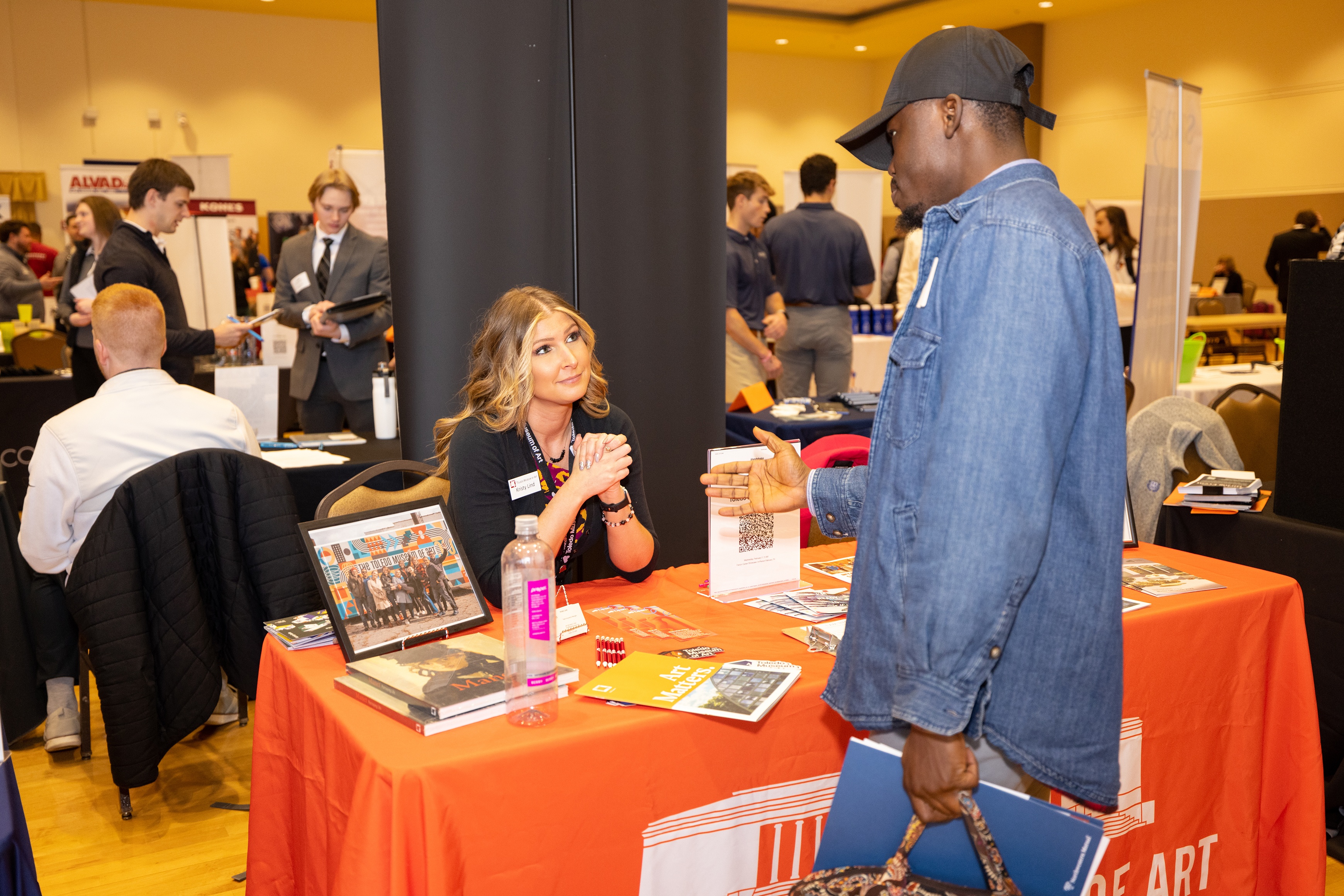 Student at table in convention