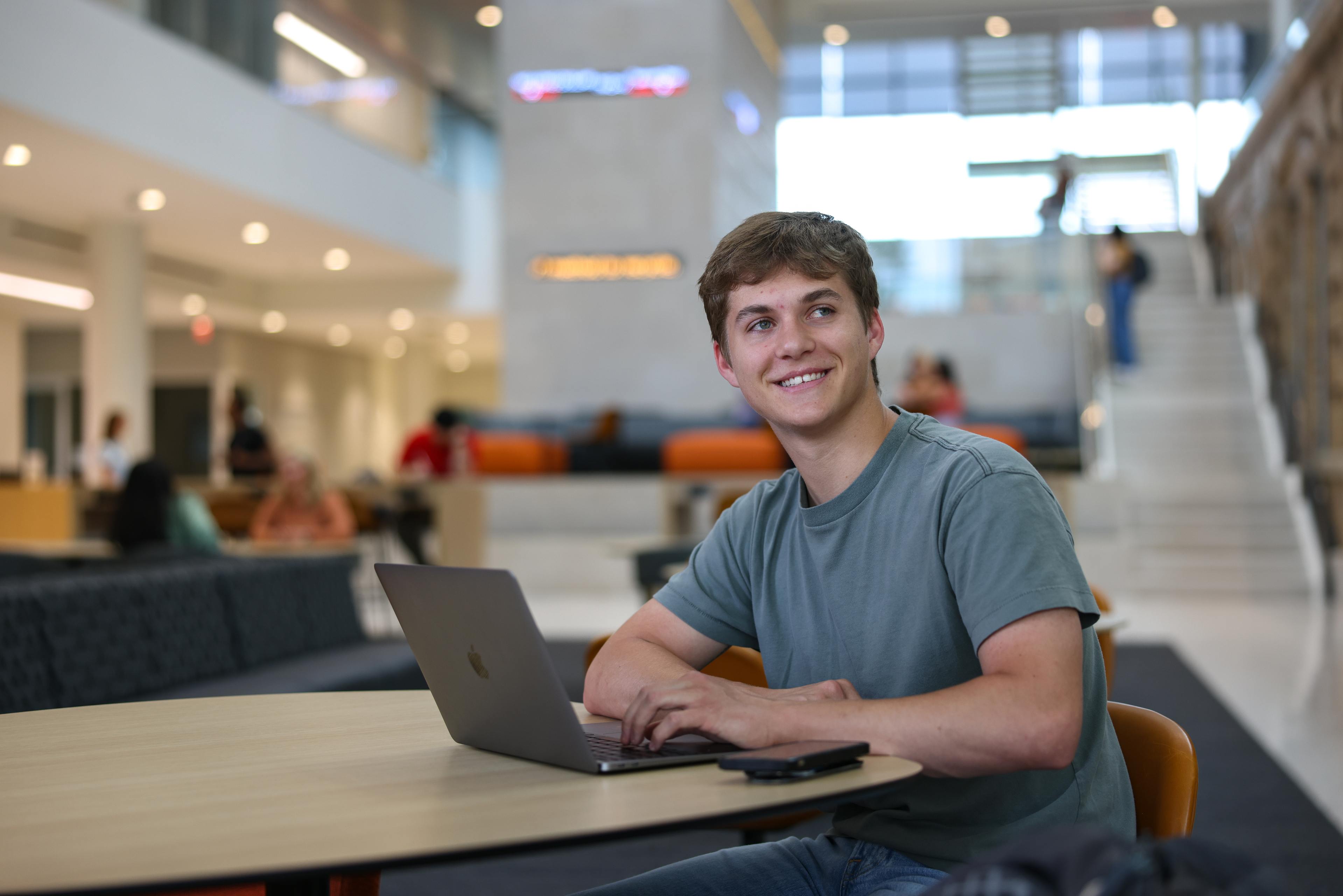 Student sitting at a table