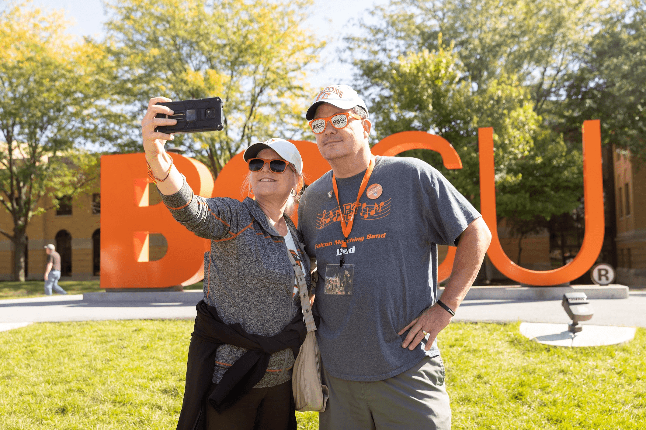 people taking a photo in front of the BGSU letters