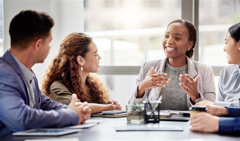 Organization Development and Change students in conversation