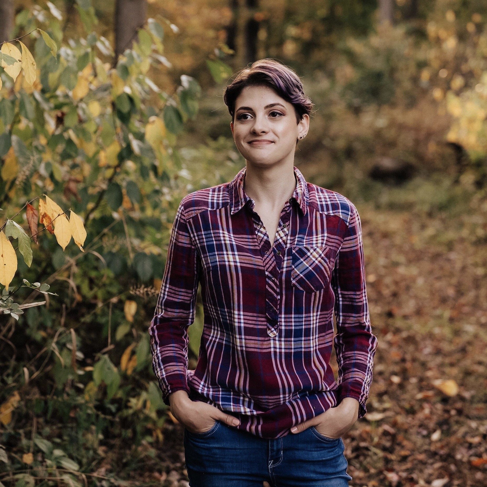 Sarah wearing a shirt and jeans
