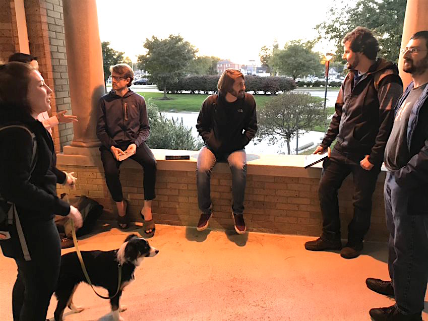 PPEL club members talking politics outside Shatzel