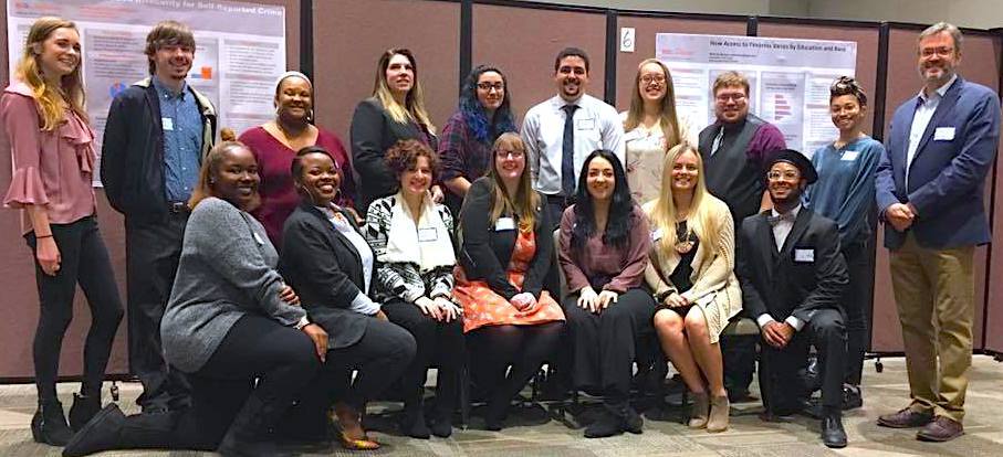 Fall 2019 Capstone students and Professor Ray Swisher at Capstone poster conference