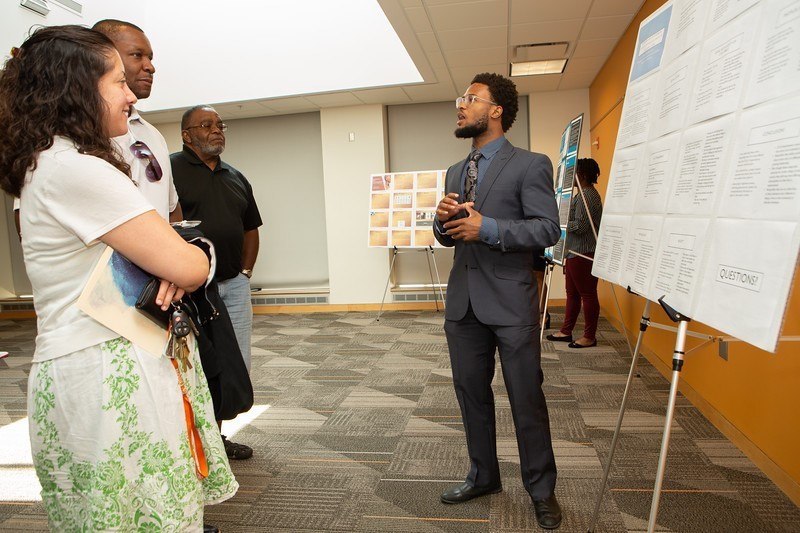 Kyle Thompson, McNair Scholars research excellence honoree, presents research poster