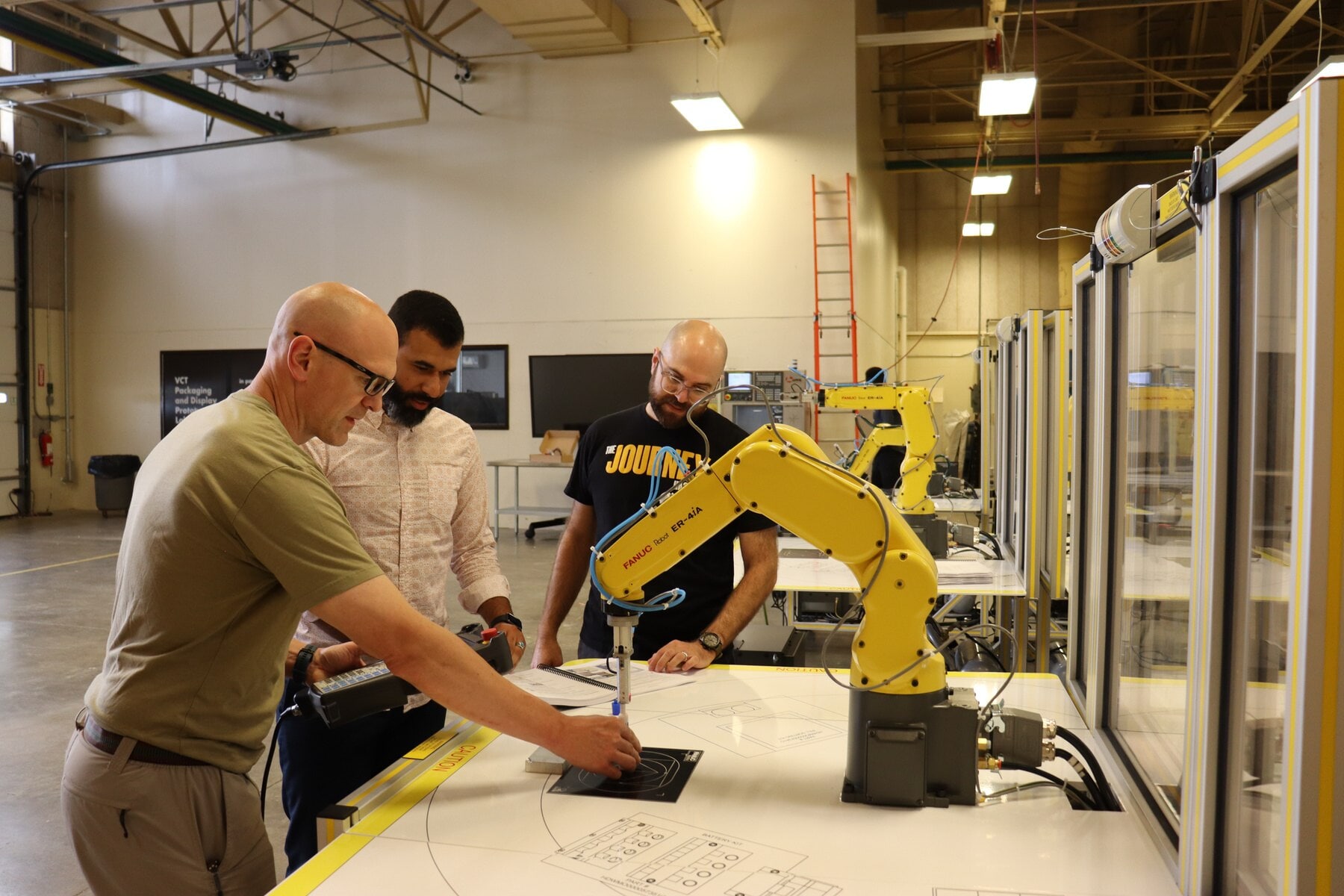 2023 NSF-RET Participants with Robot Arm