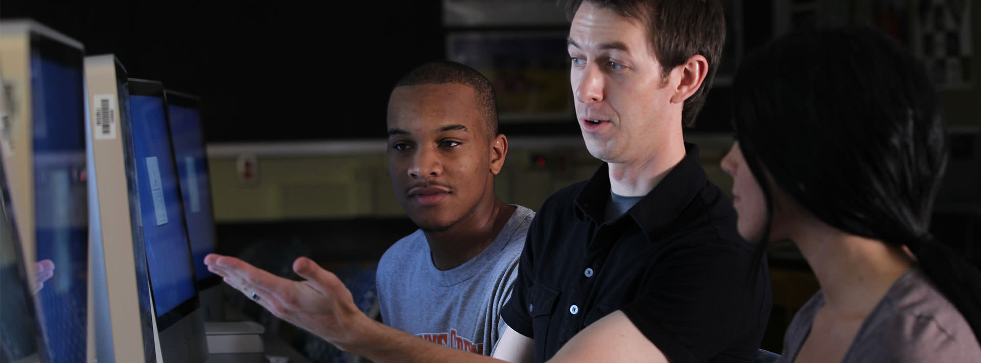 students collaborating in a lab
