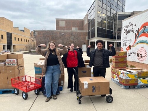 strong interns unloading a delivery