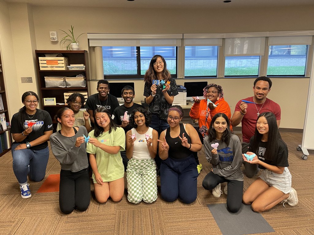 Image of Honors Students of Color group with oragami designs
