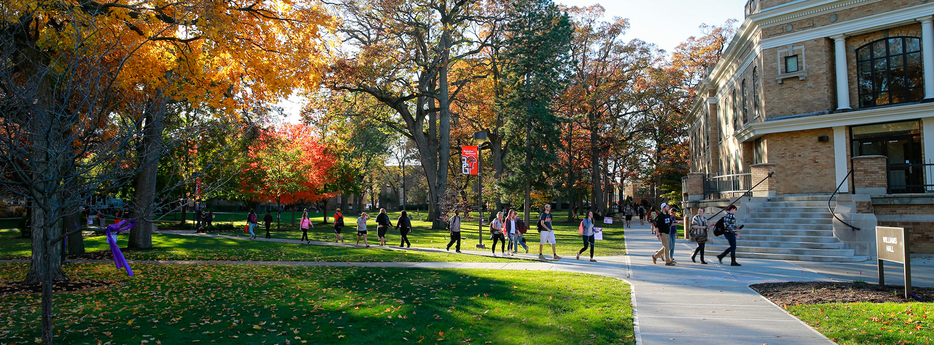 Students walking across Bowen Thompson Quadrangle