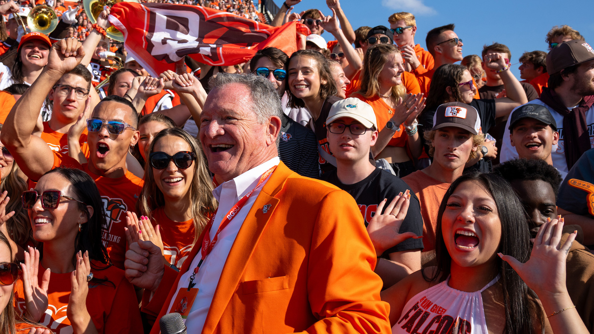 President Rogers and students cheering at BG game