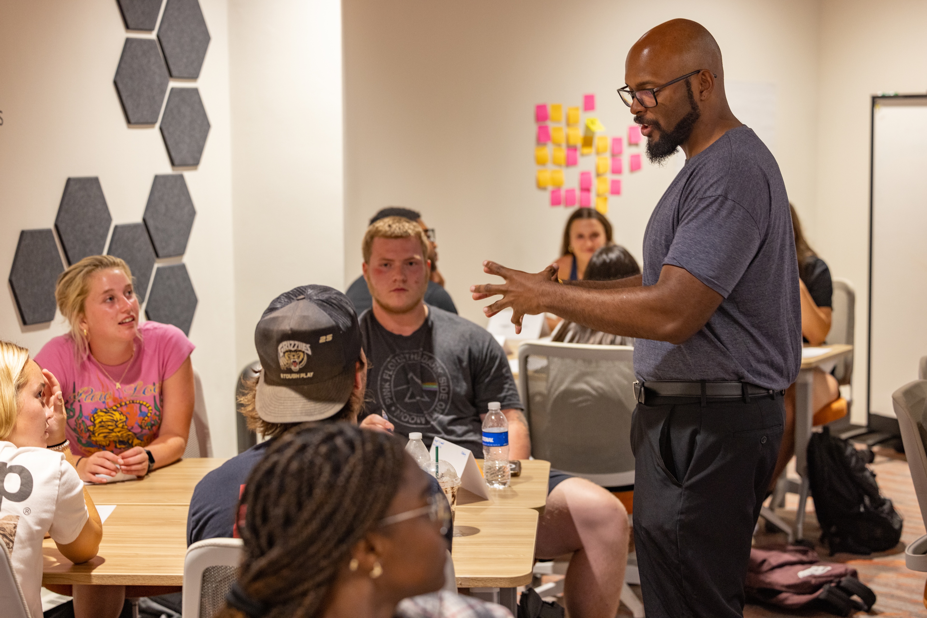 instructor teaching students in classroom setting
