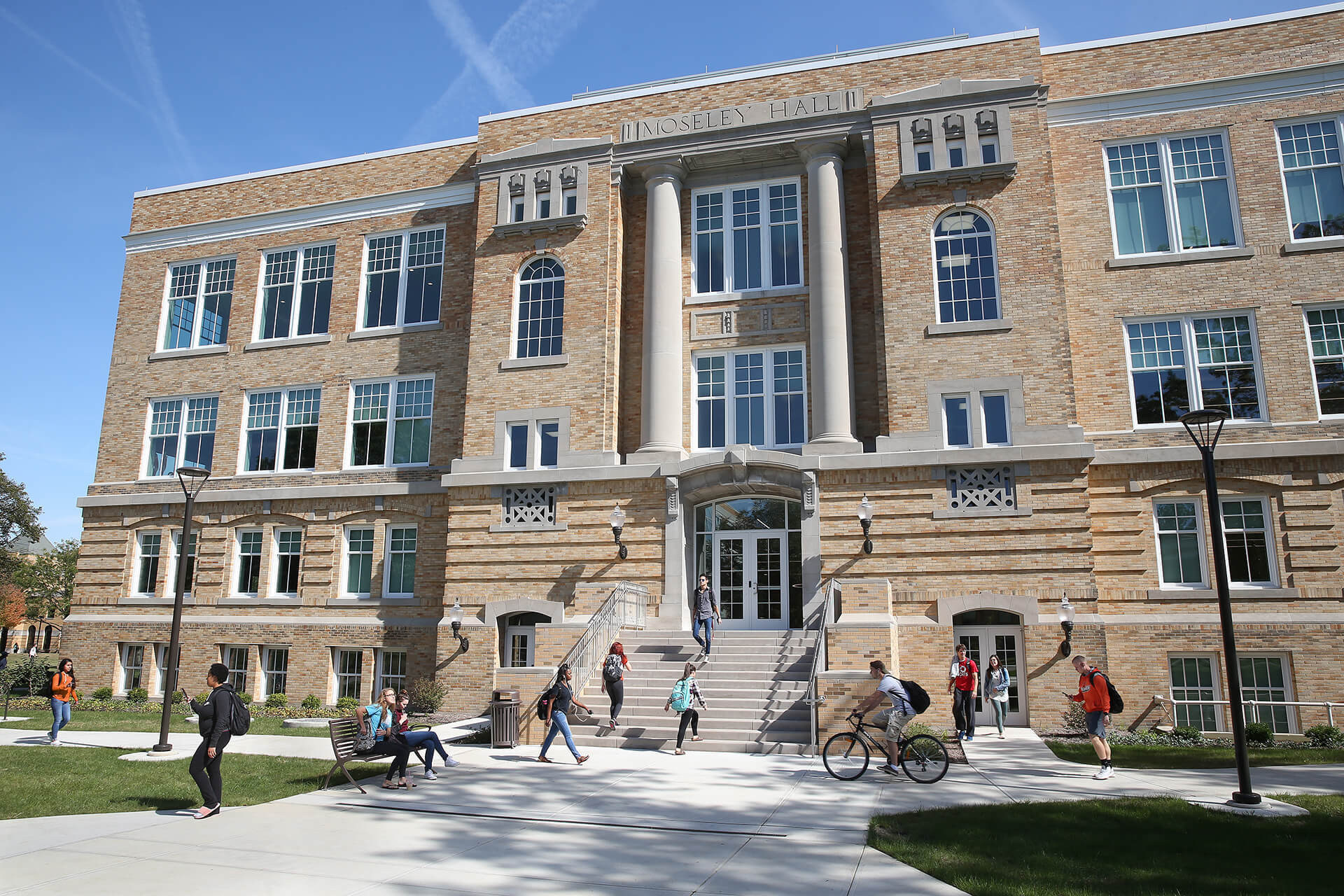Moseley Hall with students walking in front