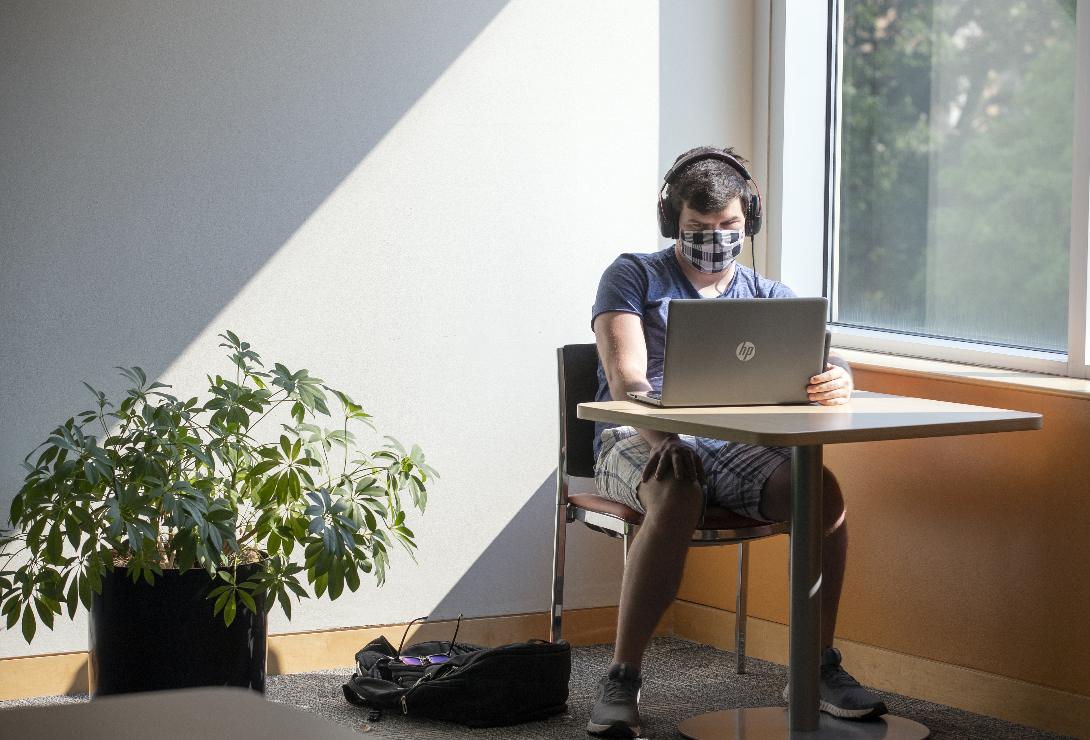 Kreschner enjoying the sun in a quiet corner of the Bowen-Thompson Student Union
