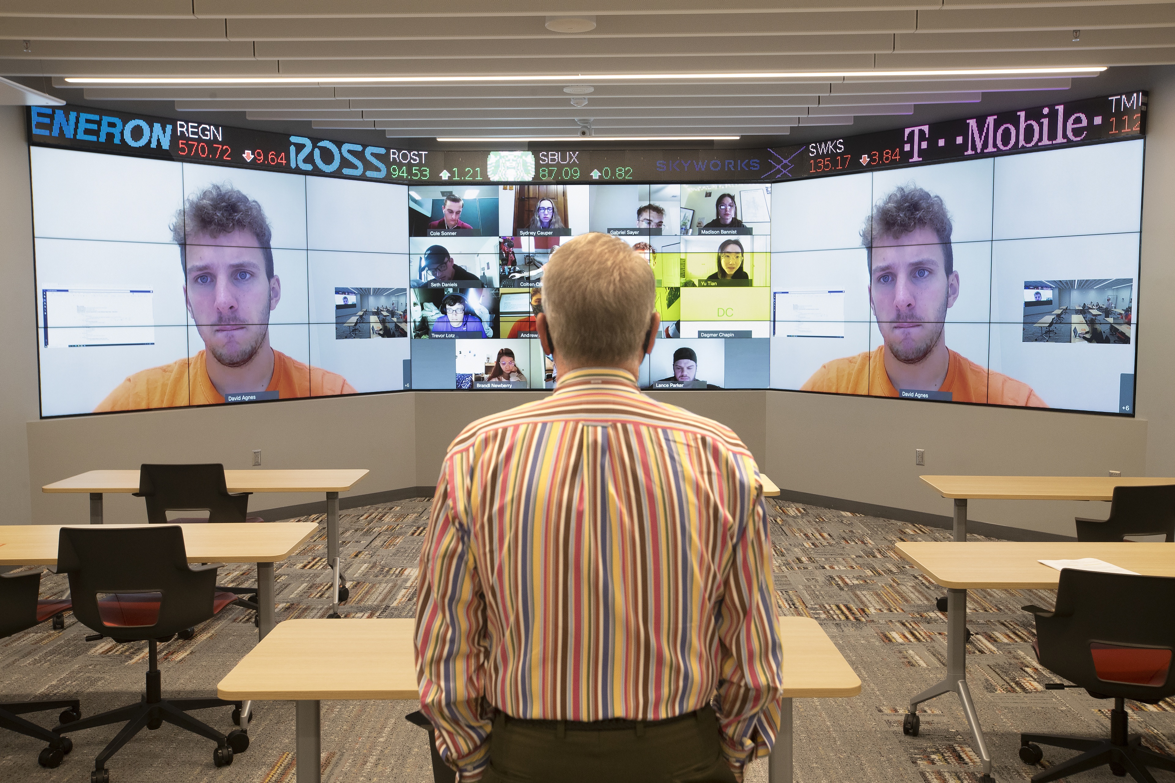 Schmidthorst College of Business Dean Ray Braun supervises a part-virtual student ambassador meeting.
