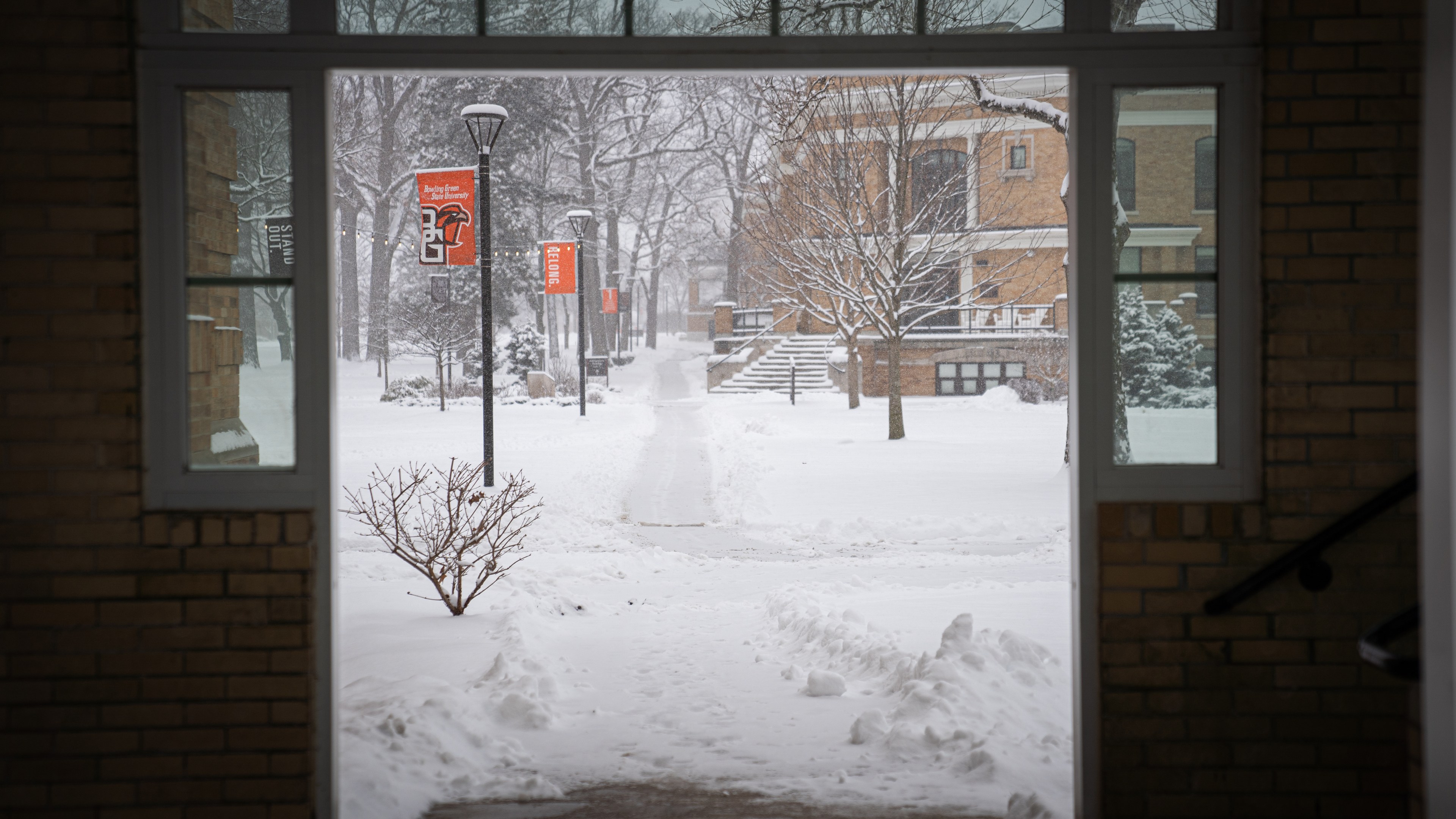  A view of Williams Hall through a walkway connecting two of the Traditions Buildings. 