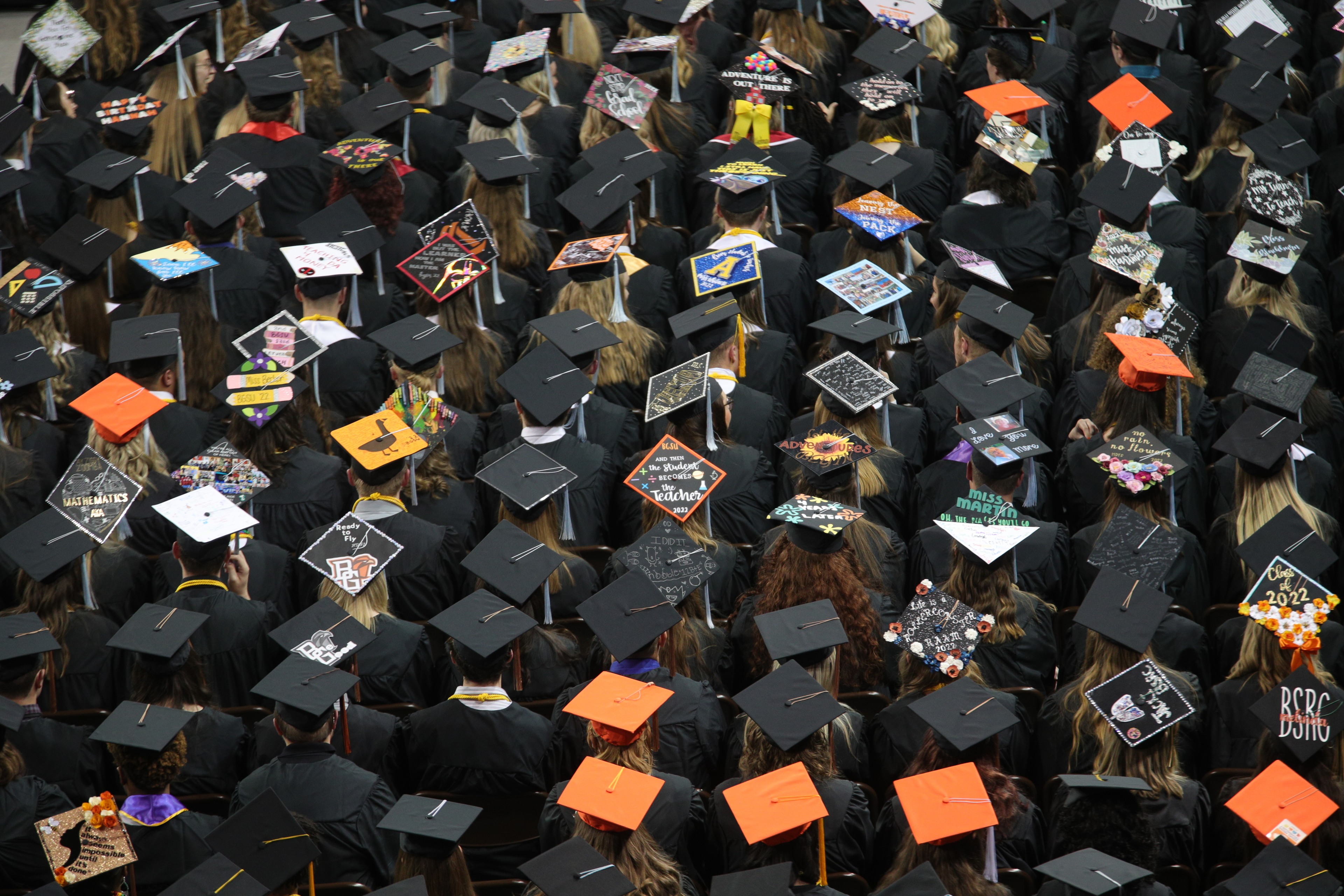 Bowling Green State University students wait to cross the stage during Commencement exercises at the Stroh Center.