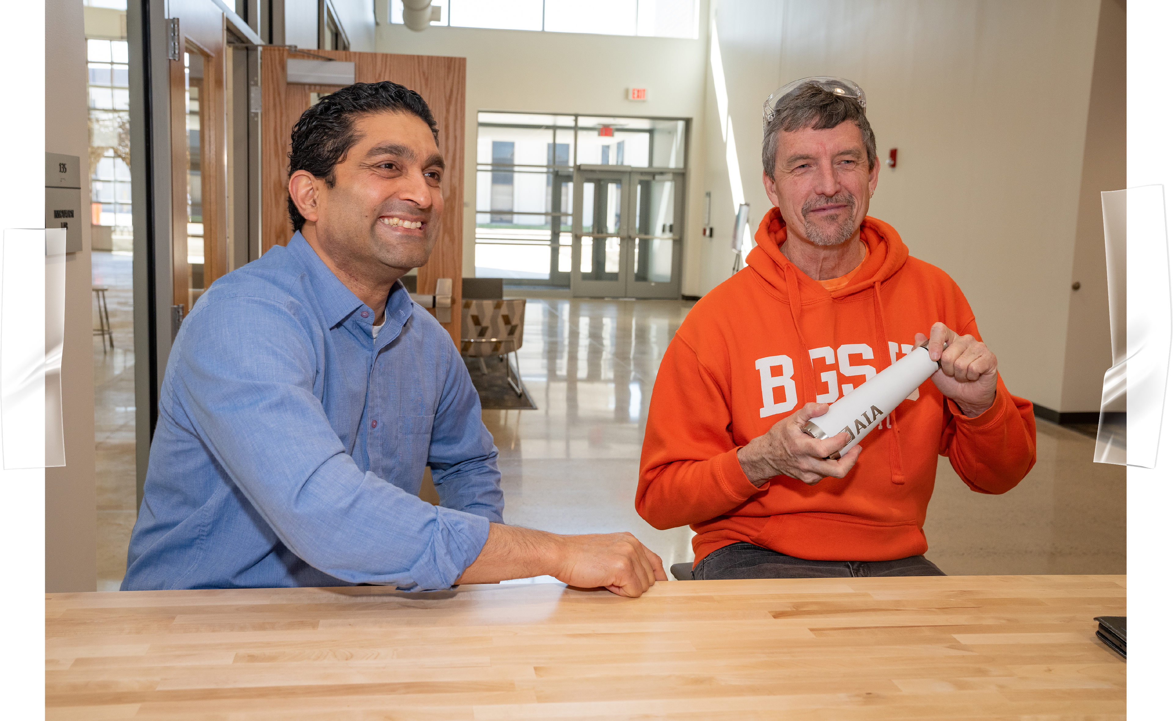 Two BGSU professors sit together in Kokosing Hall
