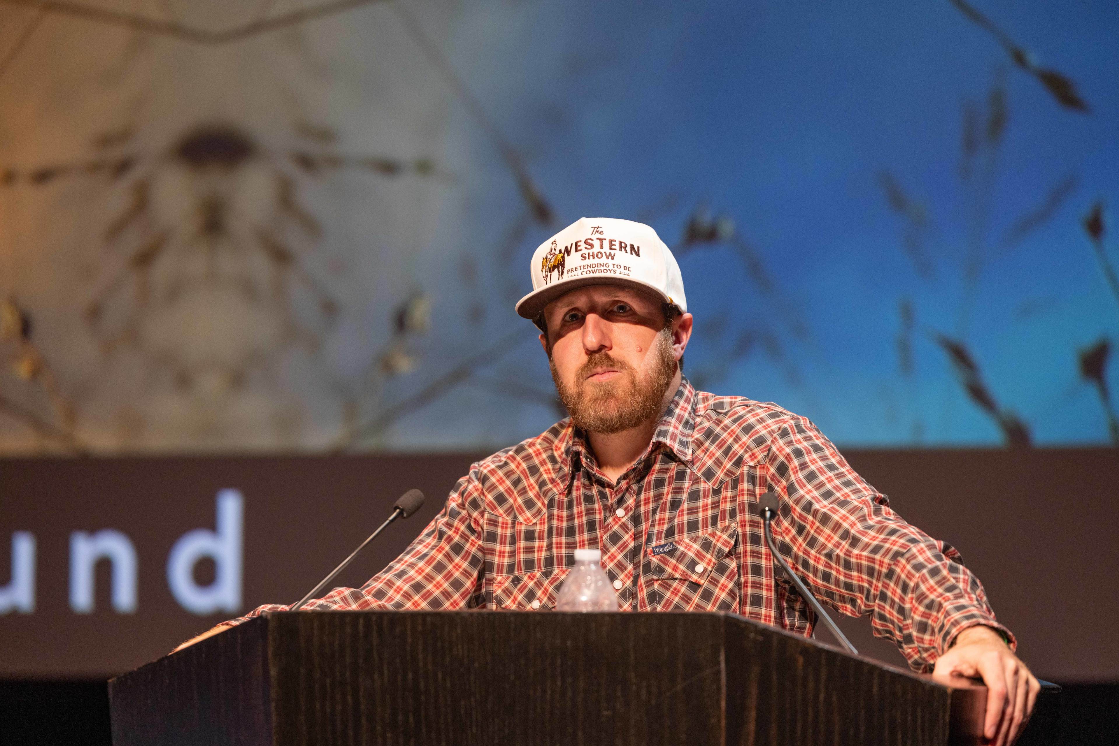 Ryan RedCorn listens to a question during a question-and-answer session.