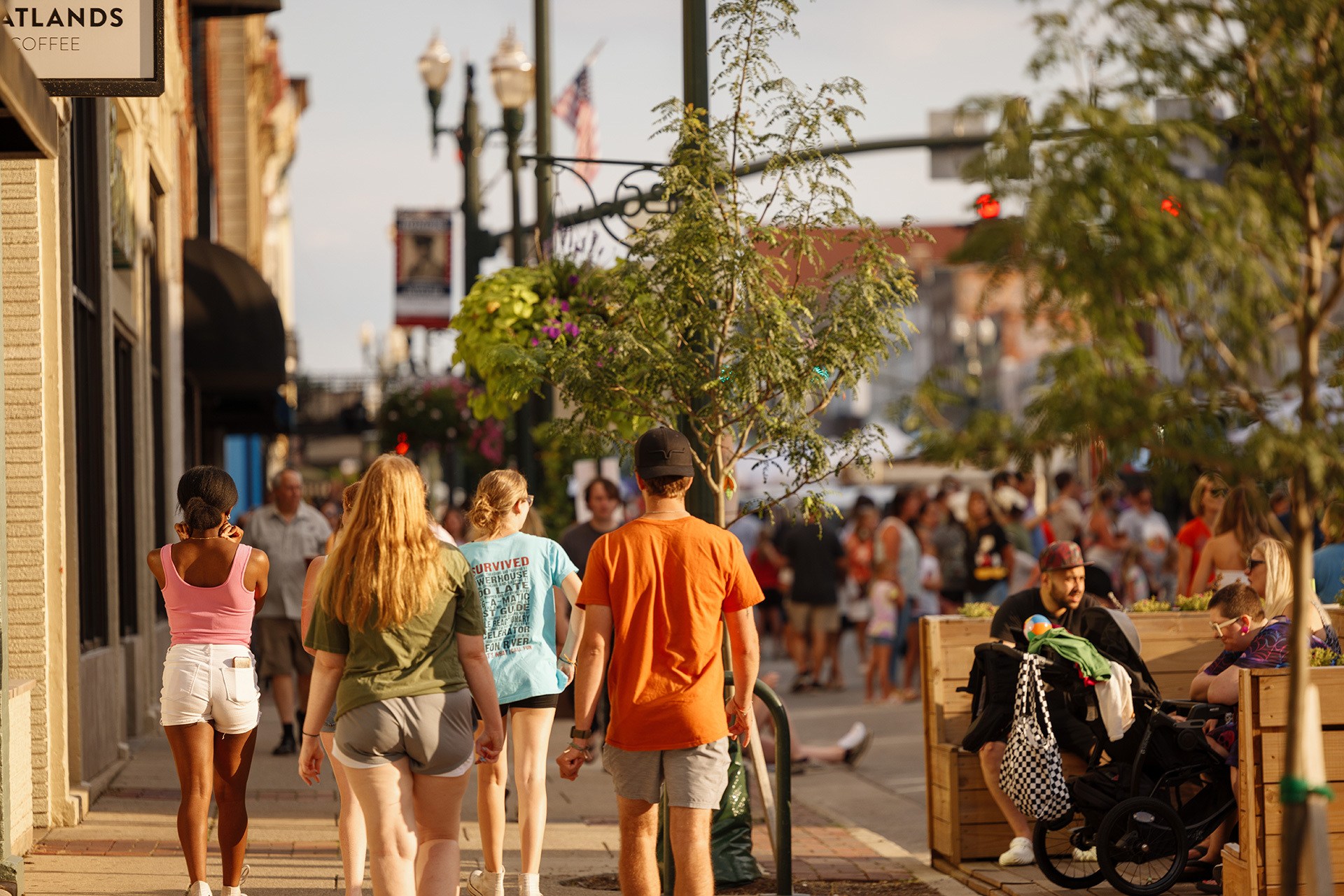 People walking down a sidewalk