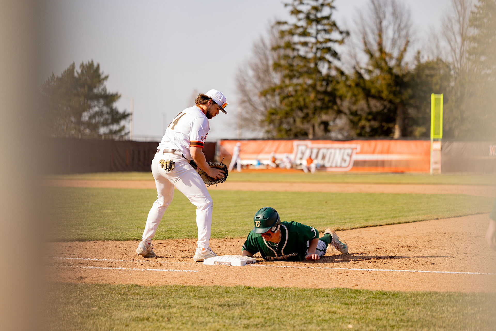 A person plays baseball.