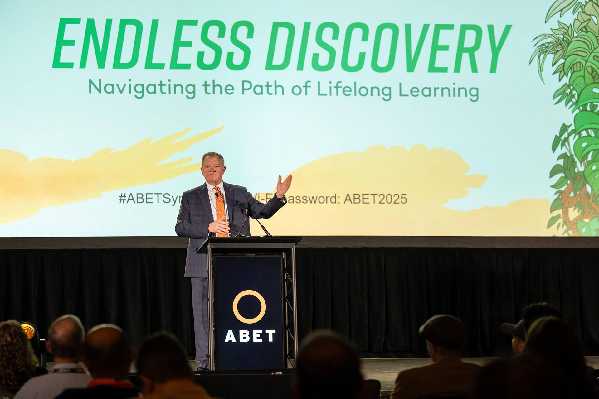 A person delivers remarks at a podium