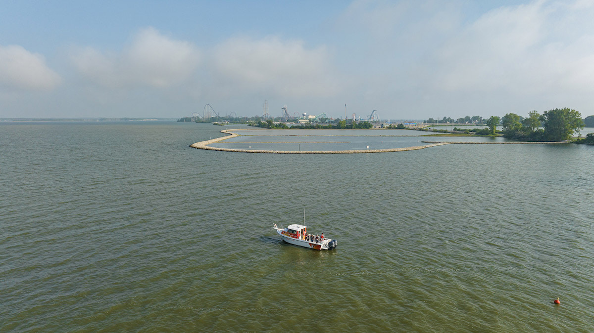 A boat travels across the water.