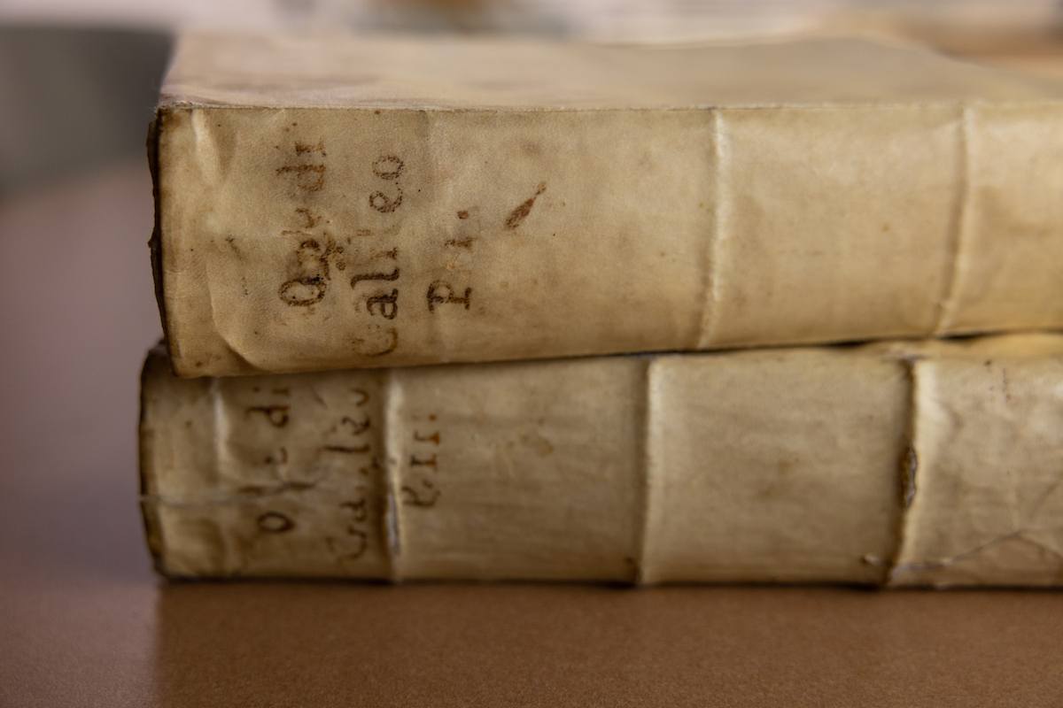 Two books stacked on a table