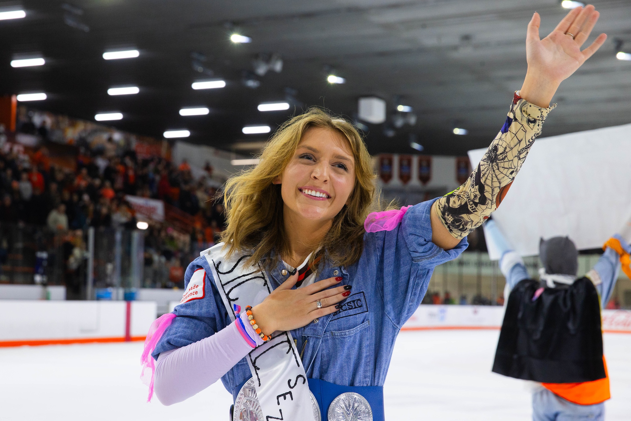Jillian Filipiak celebrates being unmasked as a member of SICSIC.