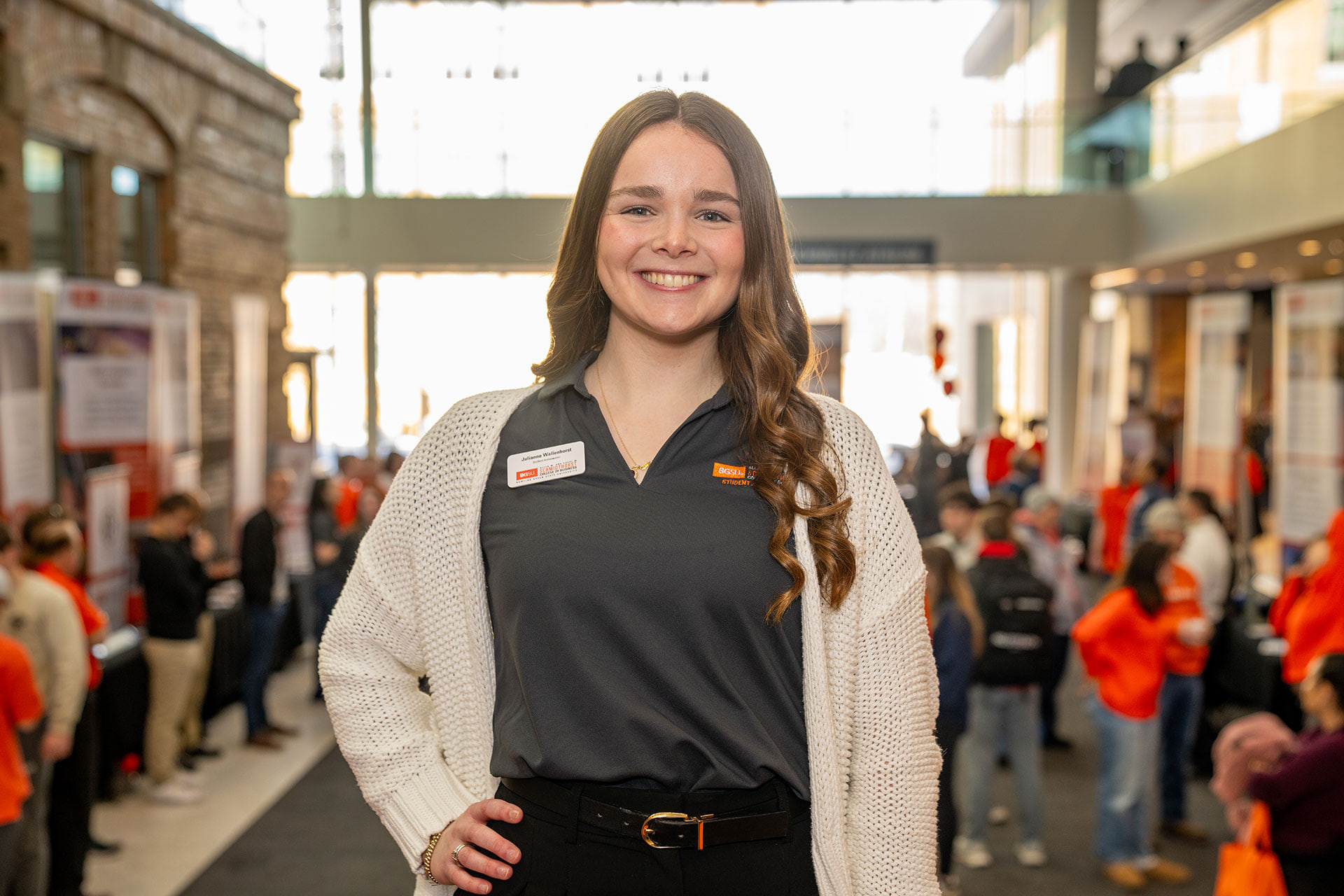 A person stands in the Maurer Center.