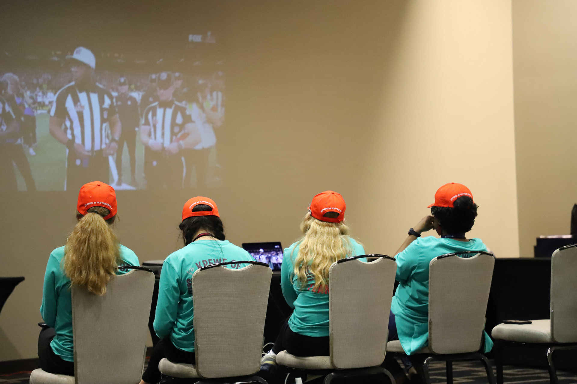  Students sit in a conference room