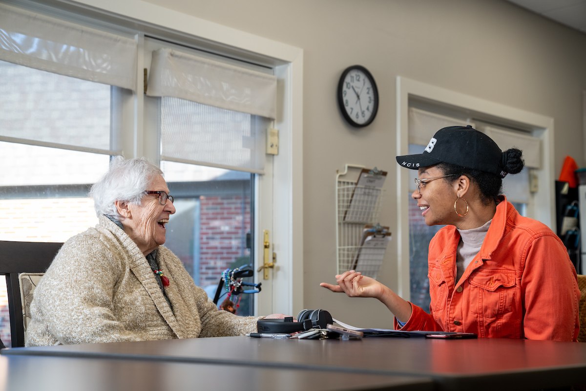 Two people talking