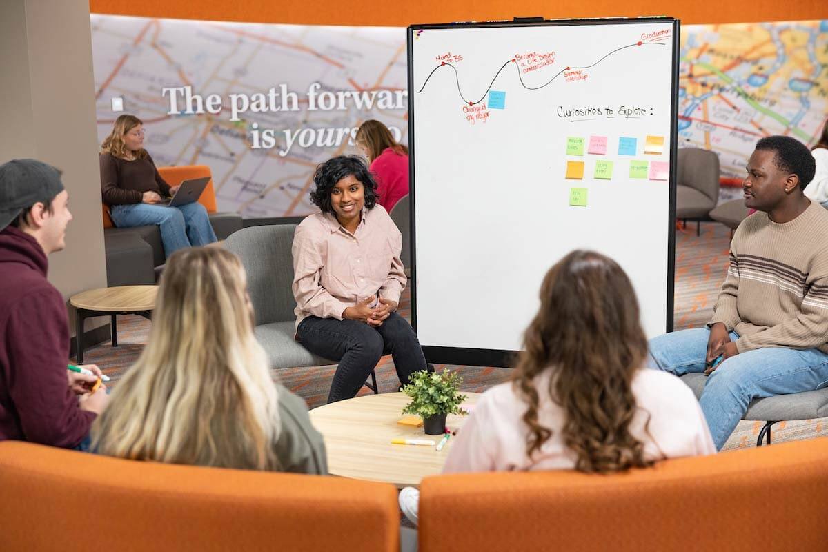 A Life Design coach works with students in the Radbill Center.