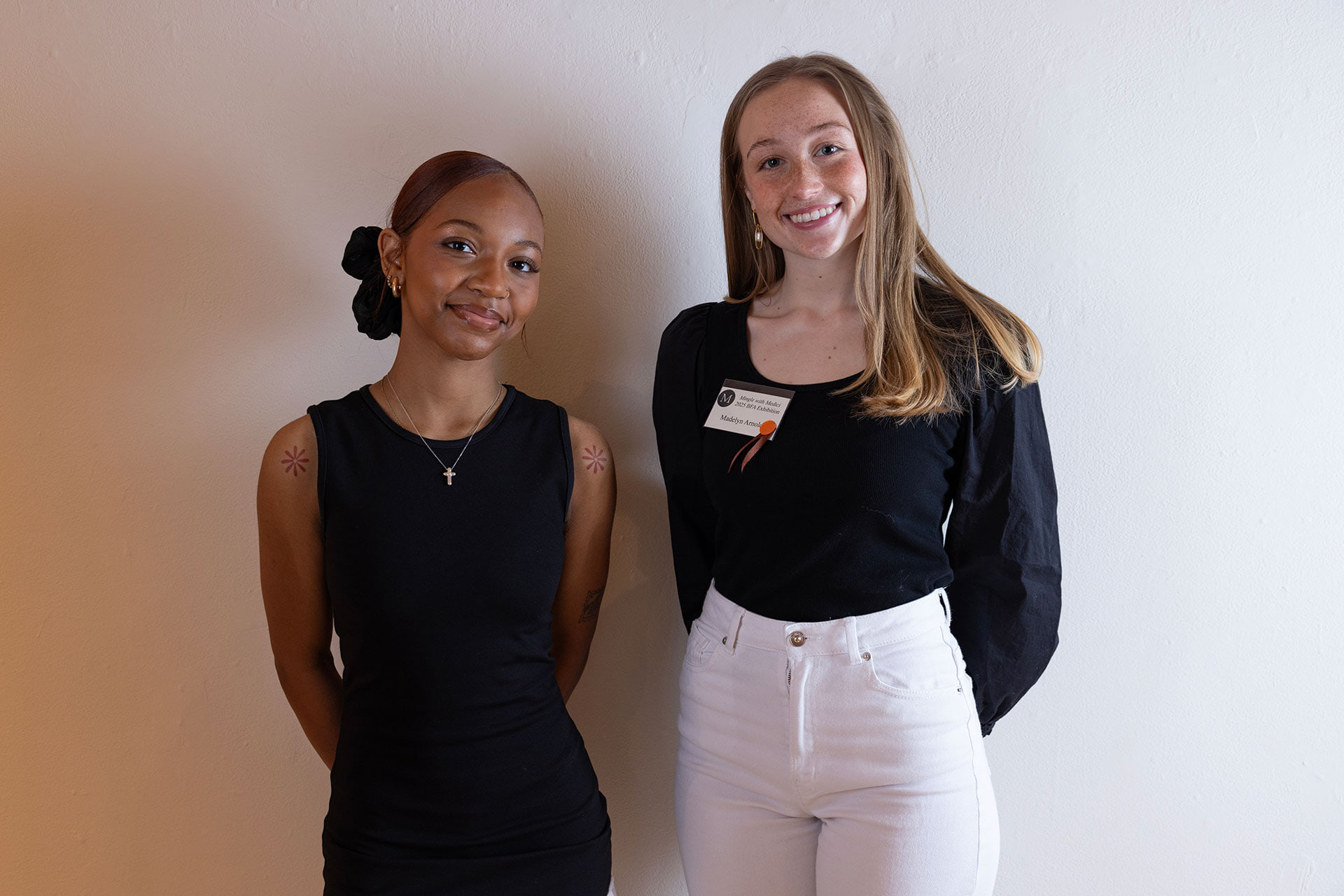 Two people pose for a picture