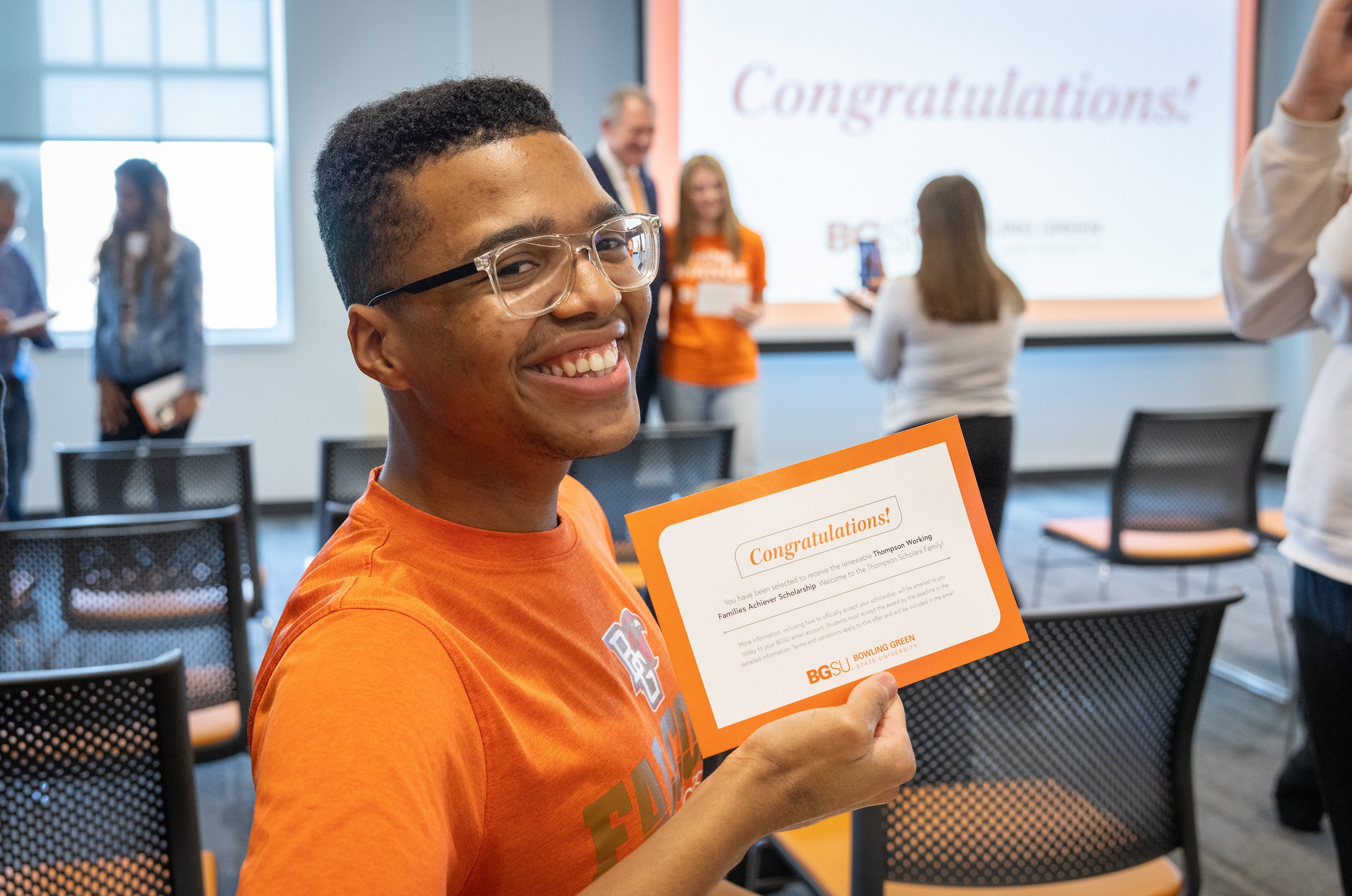 A BGSU student celebrates their selection as a Thompson Achiever Scholar.