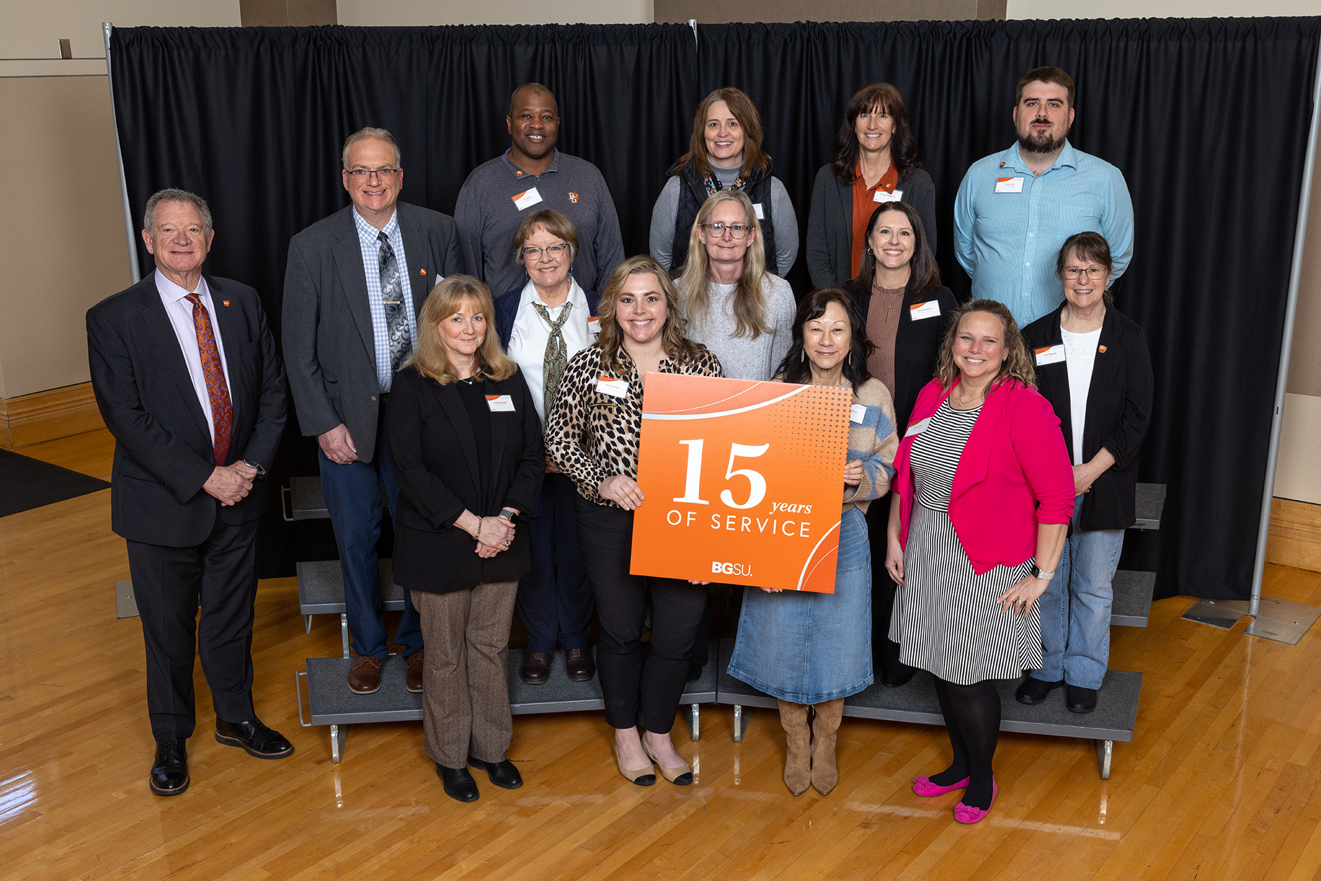 BGSU President Rodney K. Rogers stands with 15-year employees