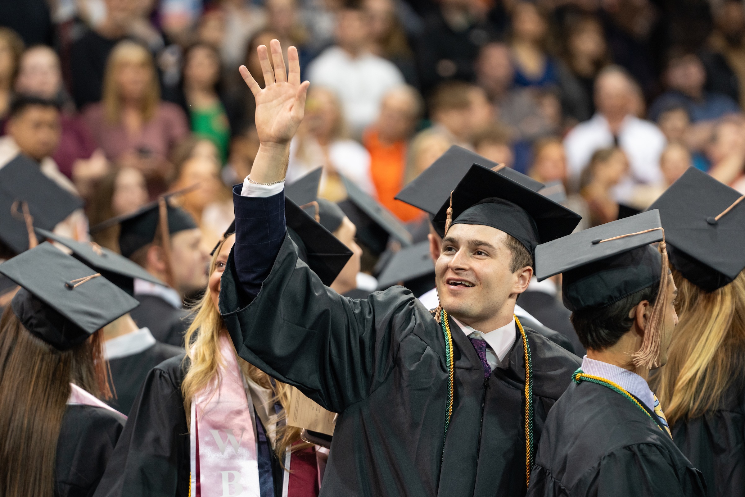 A person looks forward during commencement