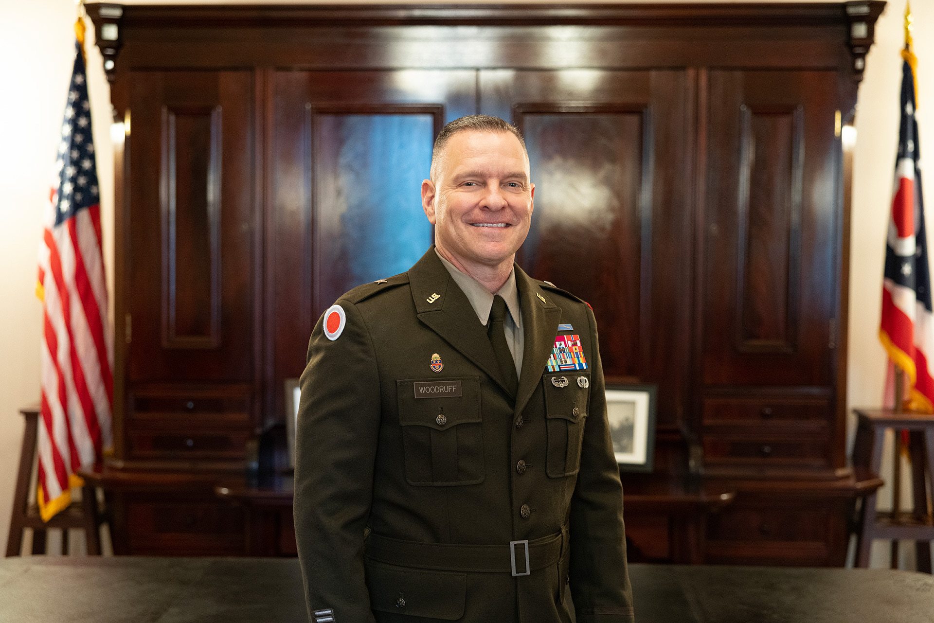A military general poses for a picture