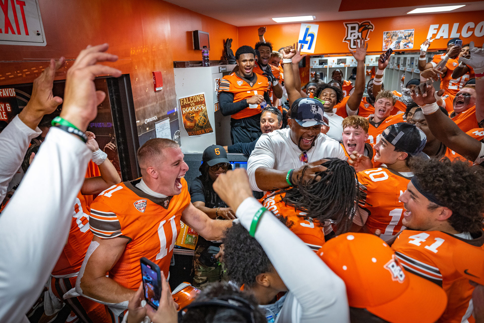 A football team celebrates a win.
