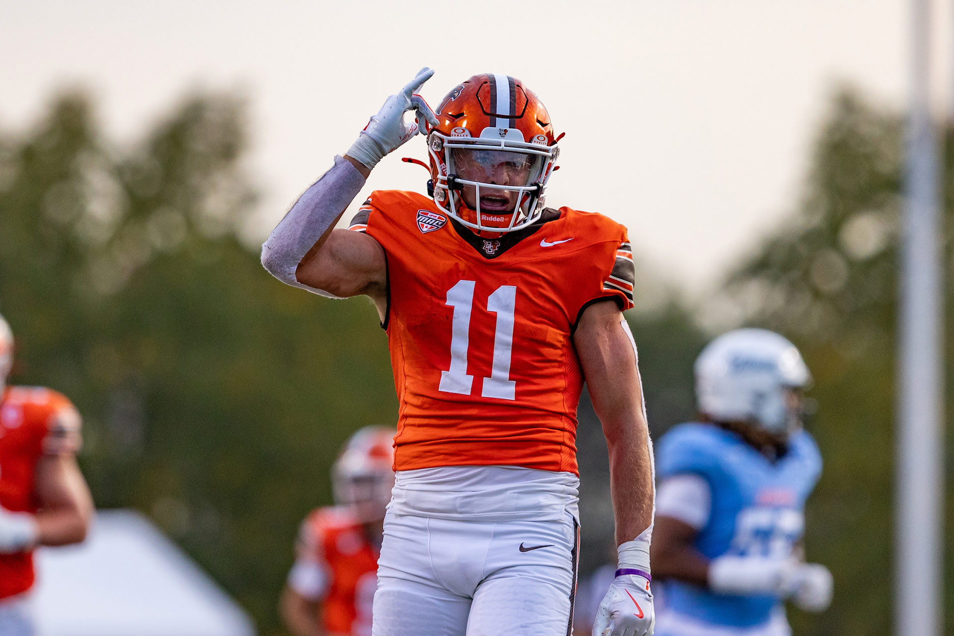 A football player celebrates.