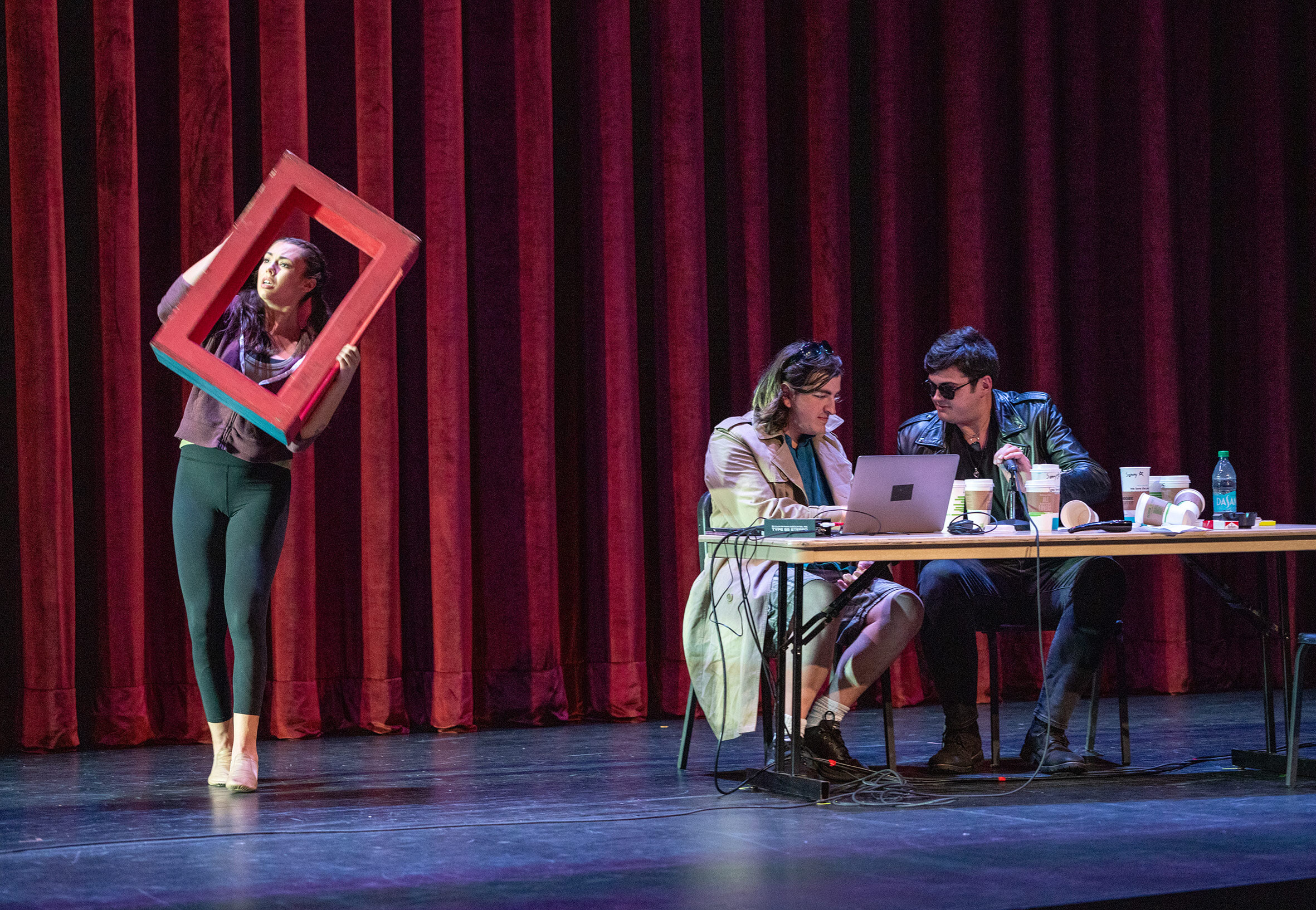 Students perform on stage.