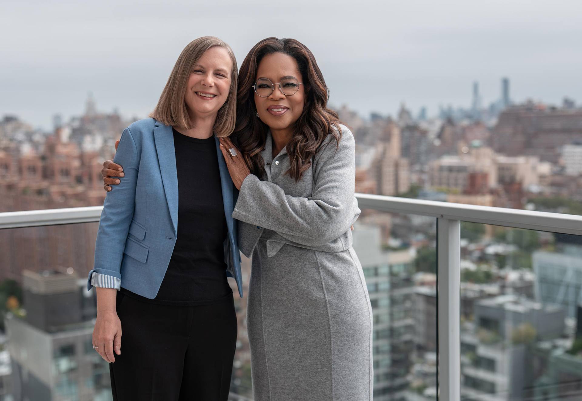 BGSU distinguished sociology professor Susan L. Brown stands with Oprah Winfrey in New York City