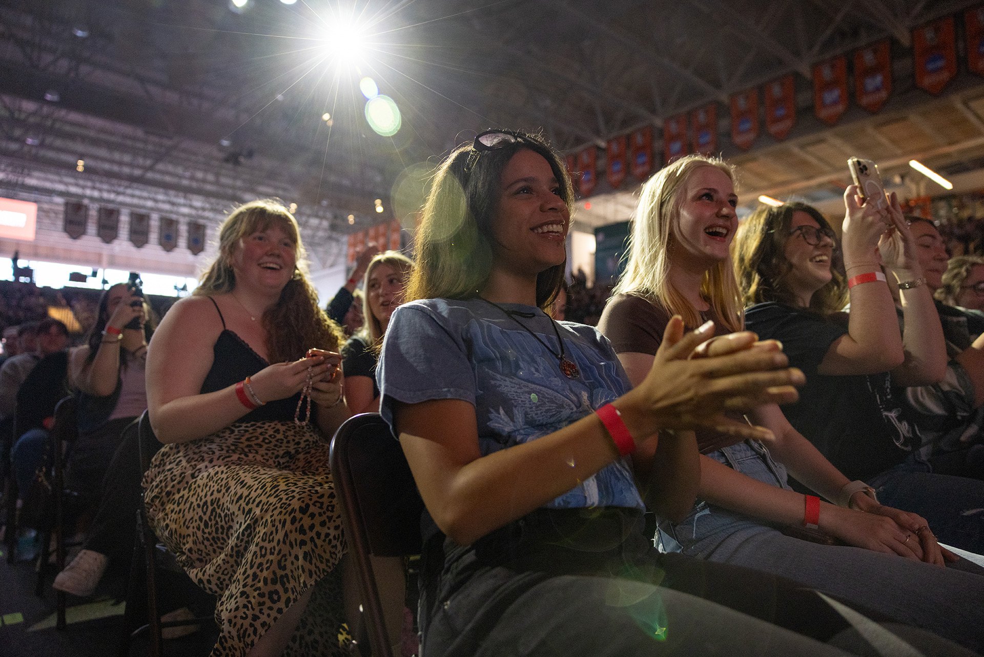 BGSU students watch Brittany Broski perform on stage.