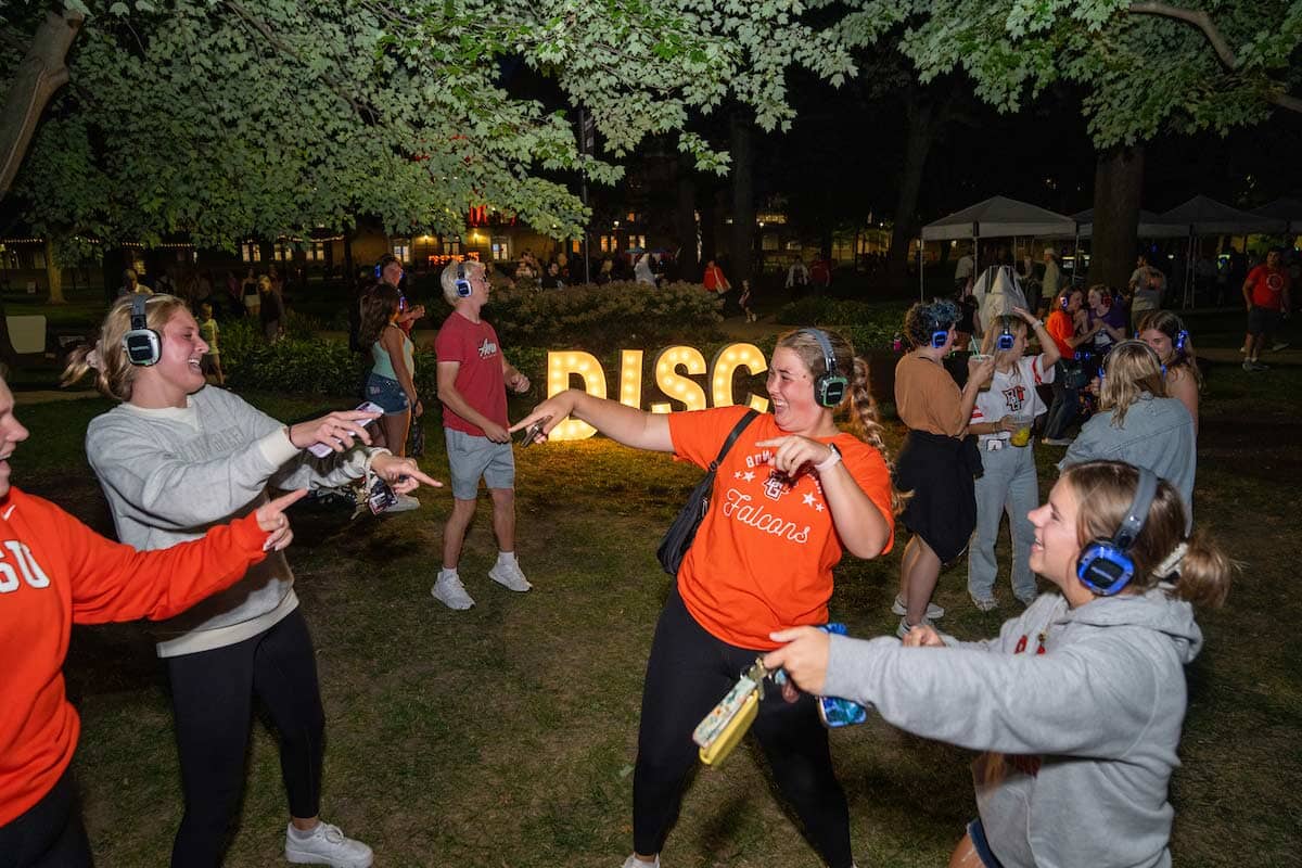 People dance during a silent disco