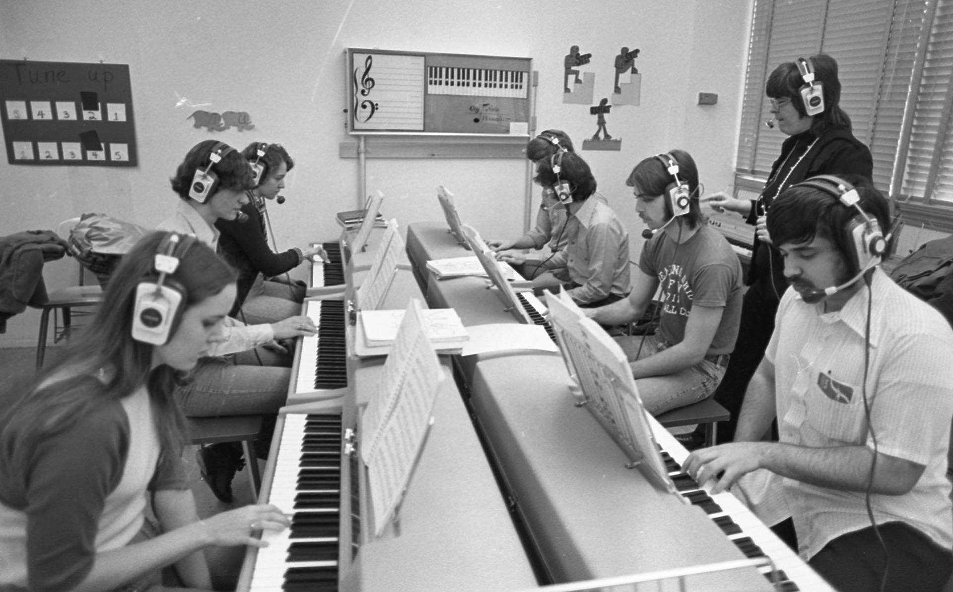 Student practice piano.