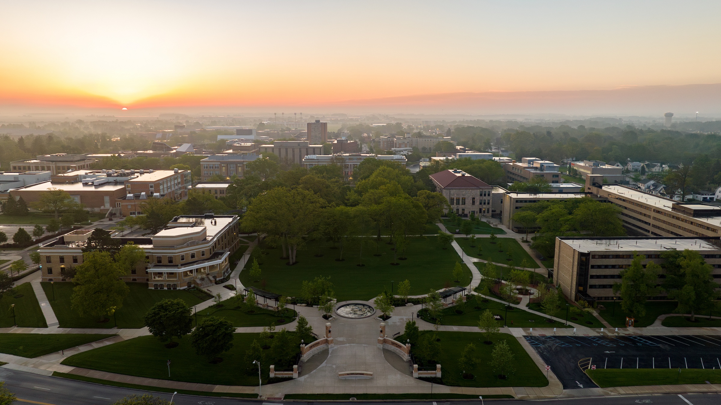 A drone image of BGSU campus as the sun rises.