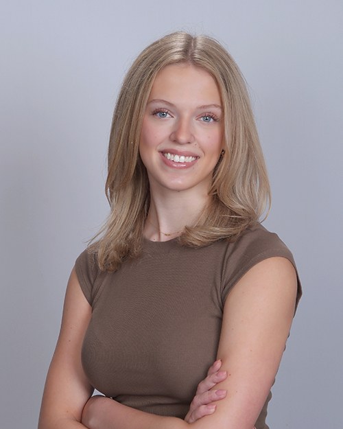 A girl poses for a picture