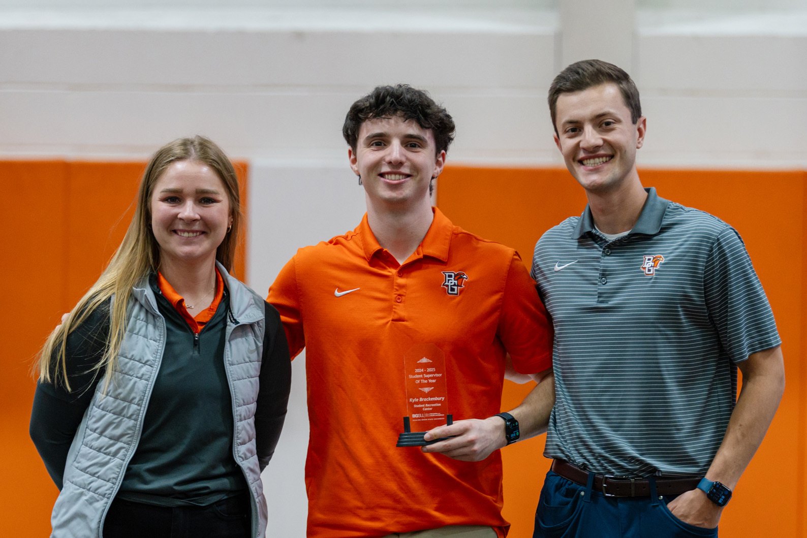 Kyle Brackenbury with Evan Strahan and Julia Adams