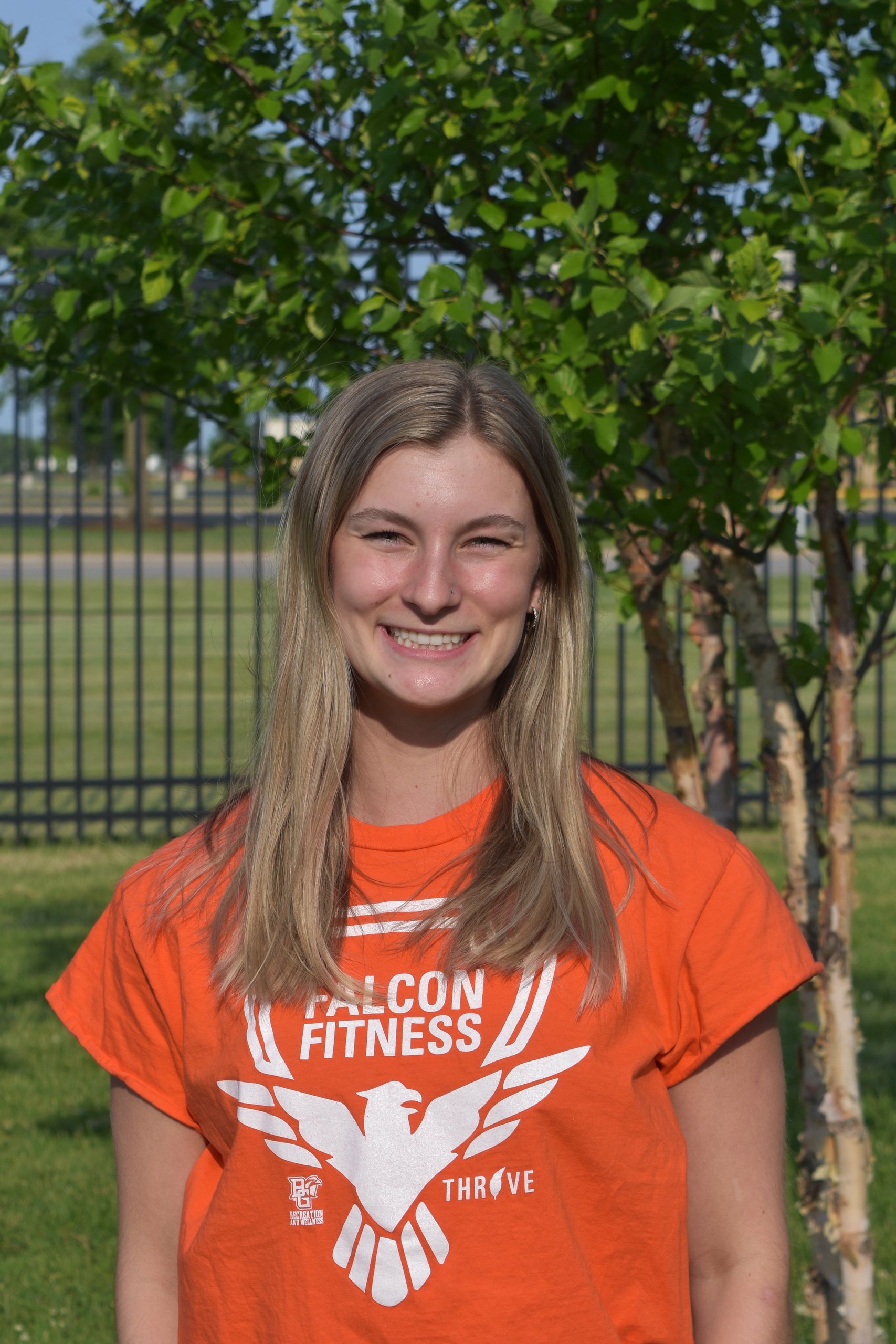BGSU student wearing a Falcon Fitness shirt