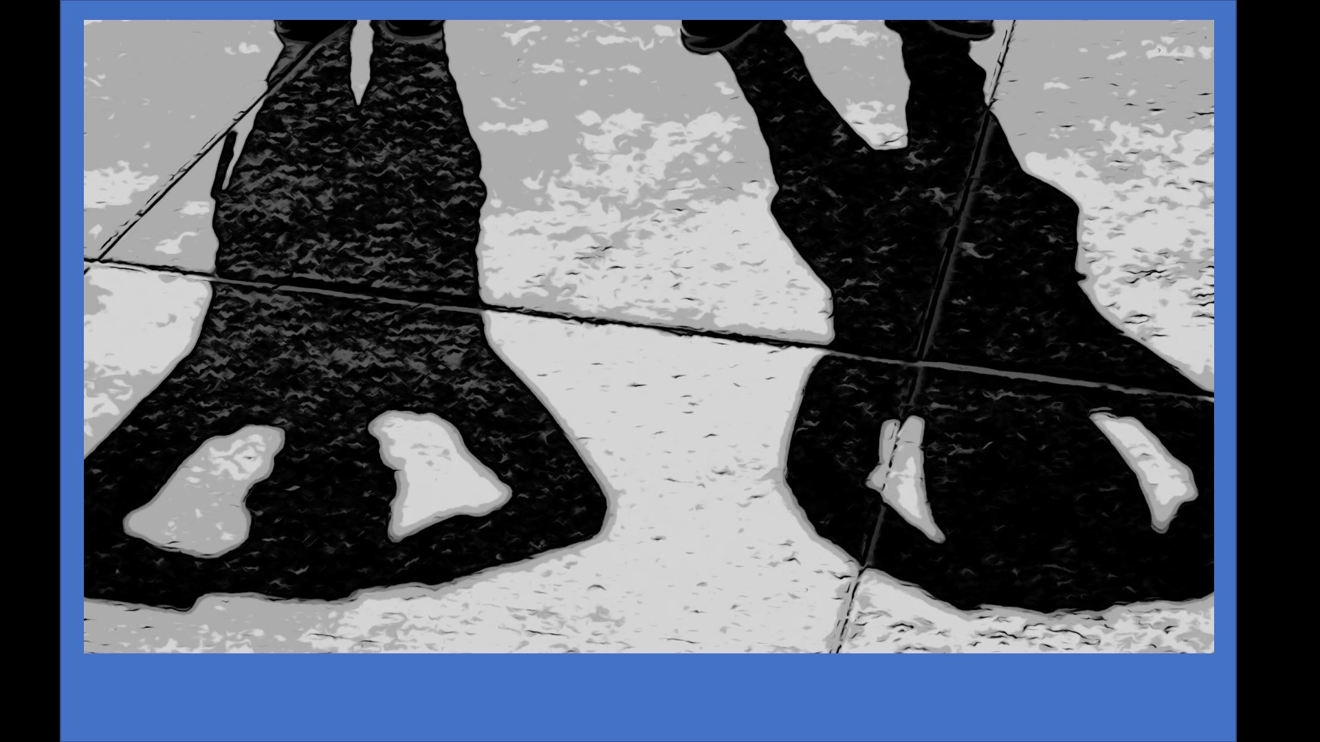 Outside photo of two shadows of people with arms around heads to make their heads look like cartoon eyes